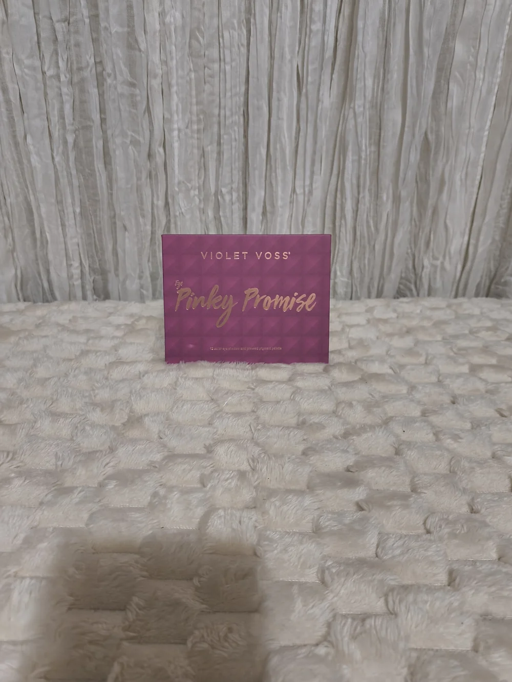 Pinky Promise boxed product on textured surface